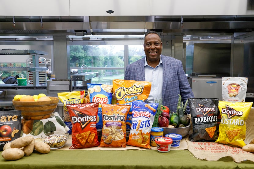 Steven Williams, CEO of PepsiCo Foods North America, beams while showing off one of his...