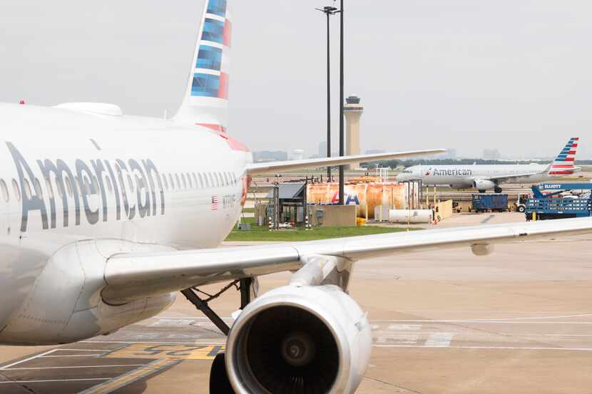 American Airlines planes are seen at the gates of Terminal A on Tuesday, May 9, 2023 at DFW...