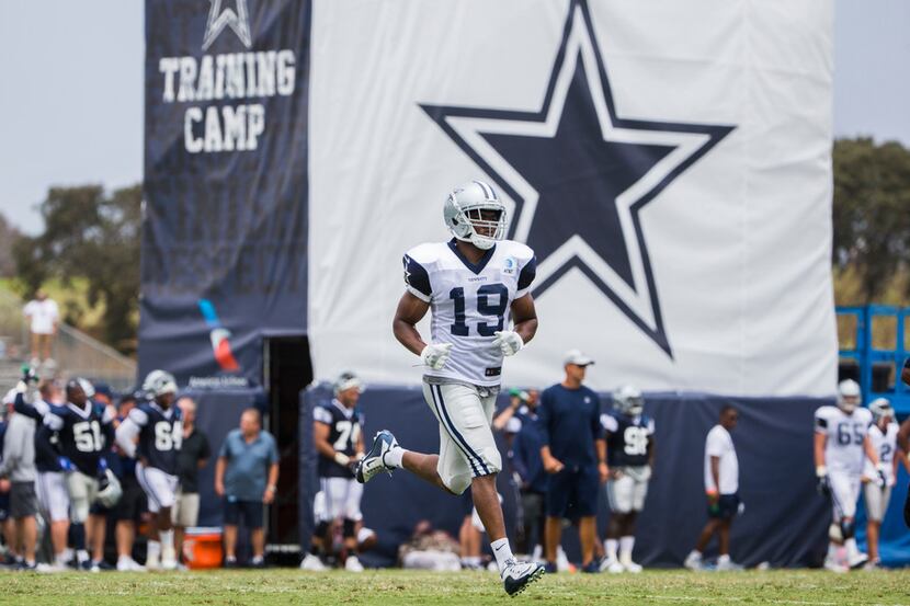 Dallas Cowboys wide receiver Amari Cooper (19) runs across the field during a morning...