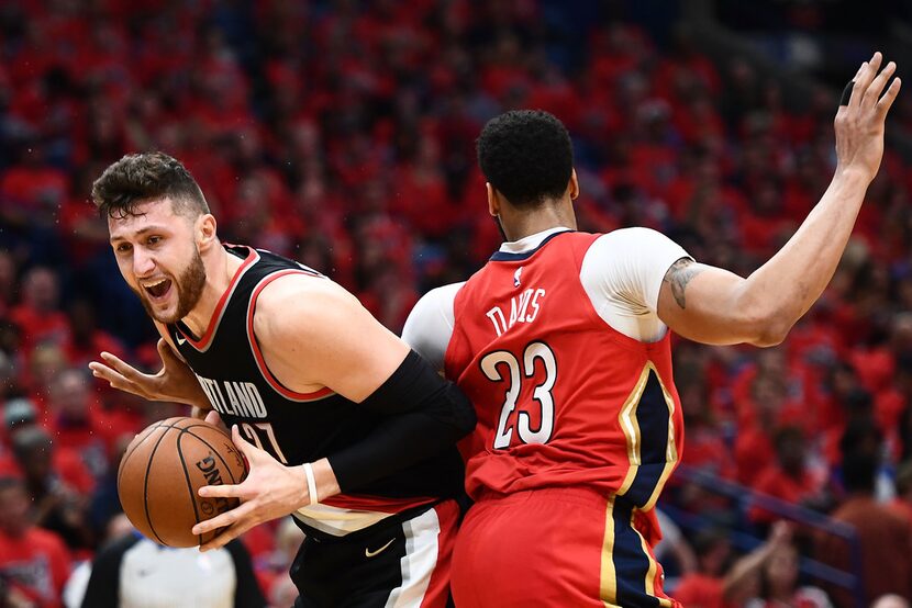 NEW ORLEANS, LA - APRIL 21:  Jusuf Nurkic #27 of the Portland Trail Blazers is defended by...