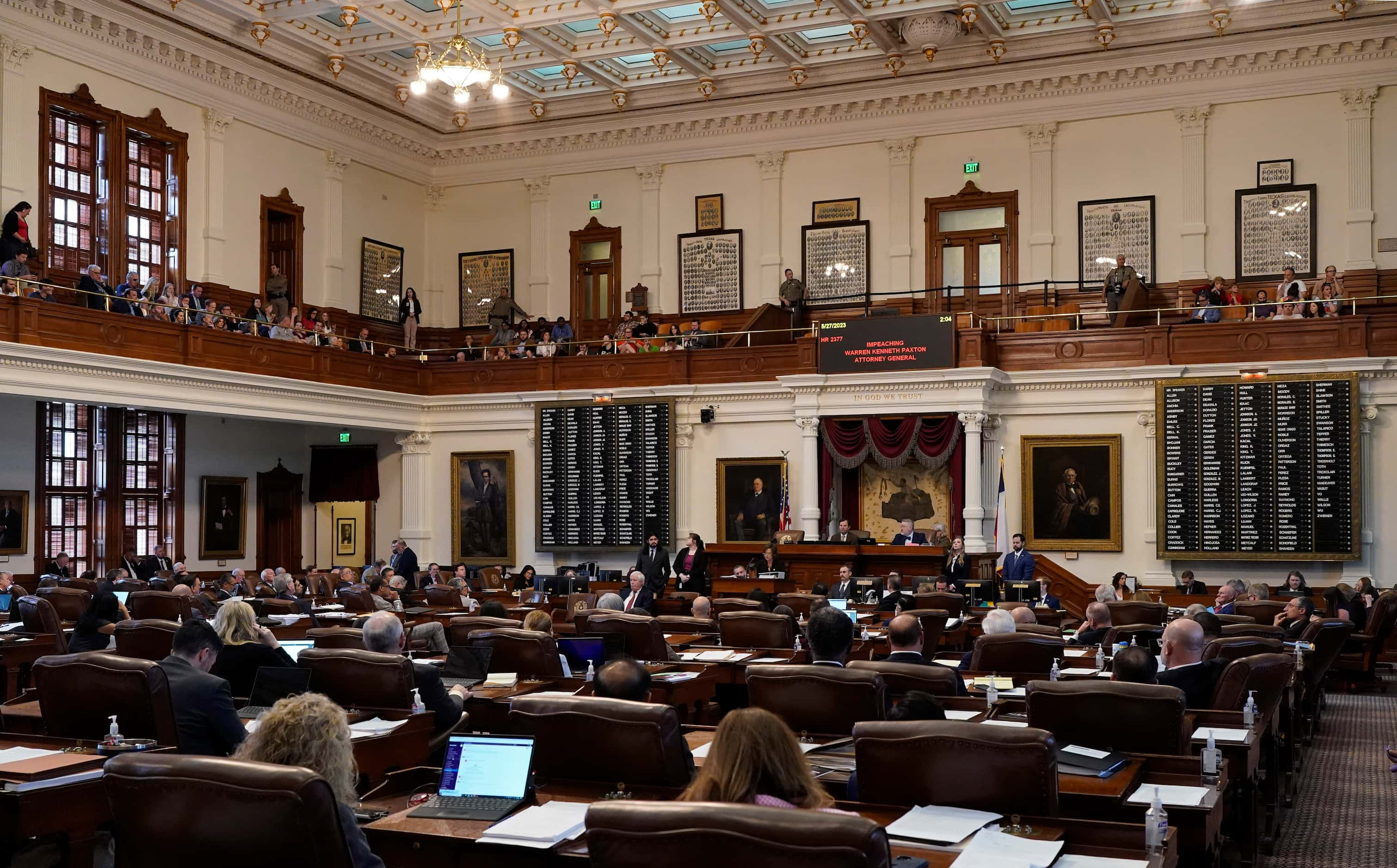 House members and visitors listen to the impeachment proceedings against state Attorney...