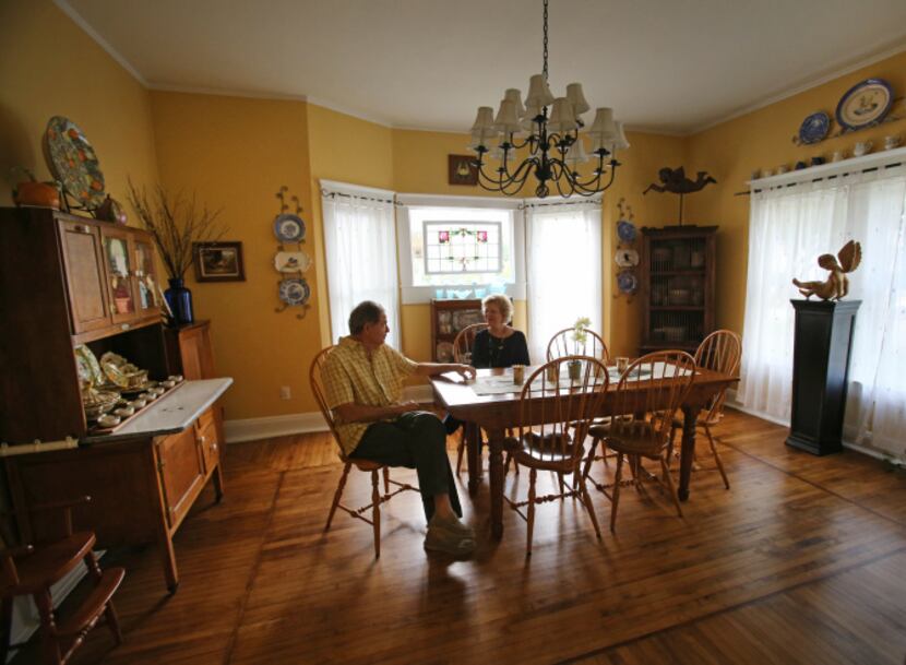 Doug and Jackie Sweat enjoy time in the dining room at their home on Junius Street in Munger...