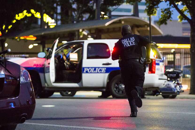 WEB USE BY TNS CONTRIBUTORS ONLY; MANDATORY CREDIT -- Dallas Police respond after shots are...