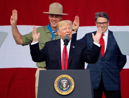 President Donald Trump joined former Boy Scouts, Interior Secretary Ryan Zinke, left, Energy...