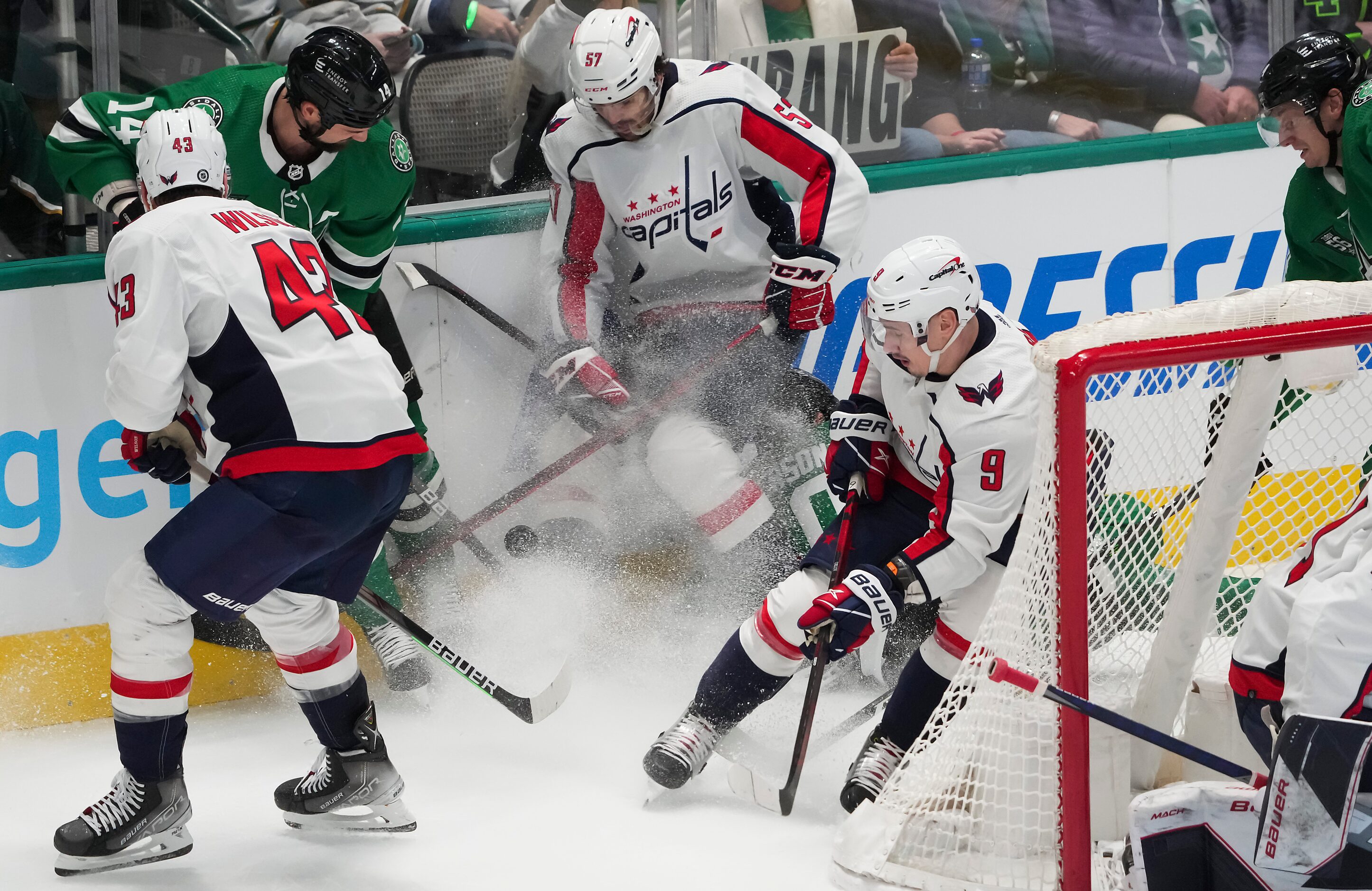 Dallas Stars left wing Jamie Benn (14) fights for the puck with Washington Capitals...