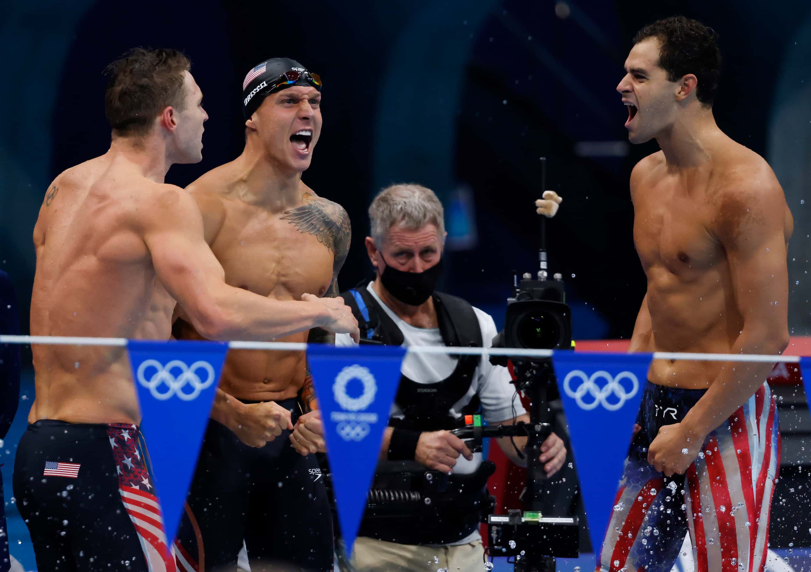 USA’s Ryan Murphy, Caeleb Dressel and Michael Andrew celebrate after Zach Apple finished the...