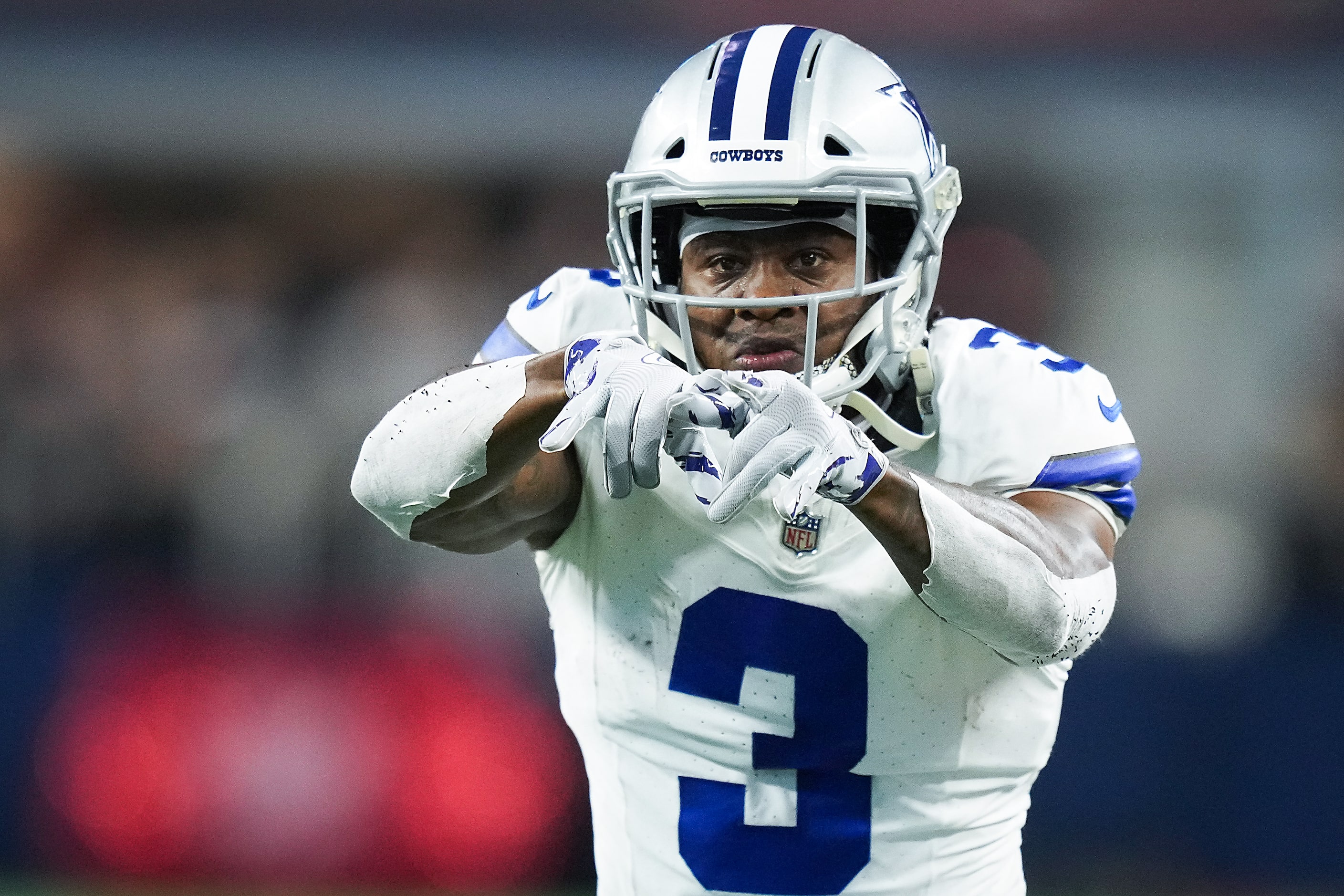 Dallas Cowboys wide receiver Brandin Cooks celebrates after catching a pass for a first down...