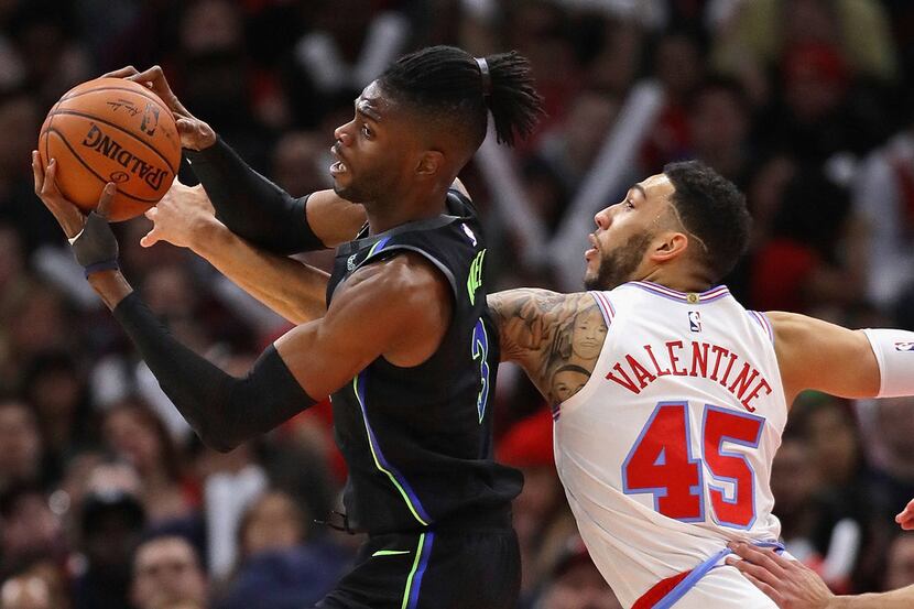 CHICAGO, IL - MARCH 02:  Nerlens Noel #3 of the Dallas Mavericks rebounds against Denzel...