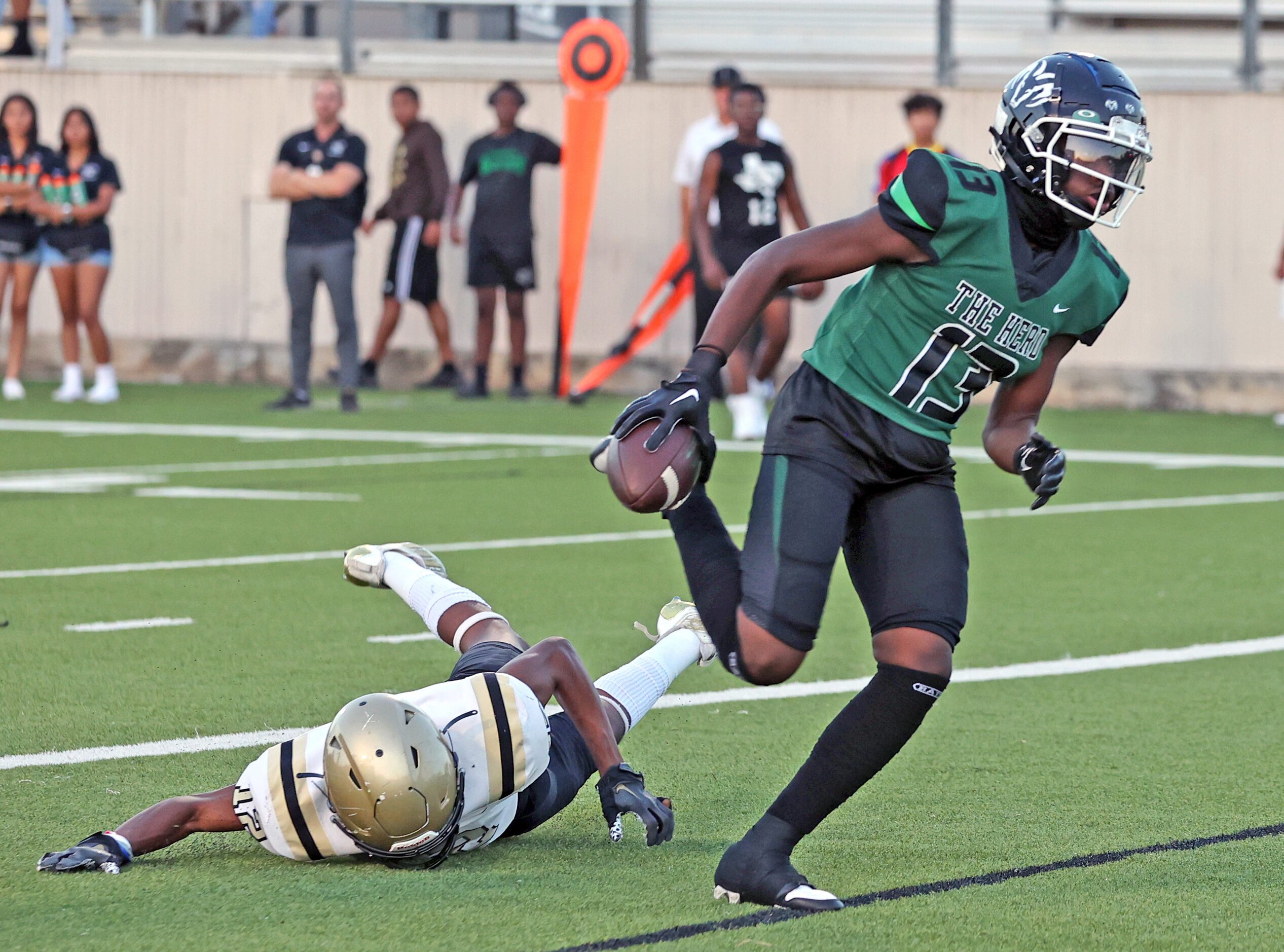 Richardson Berkner high Demarcus Calhoun (13) runs into the end zone for the Rams’ first...