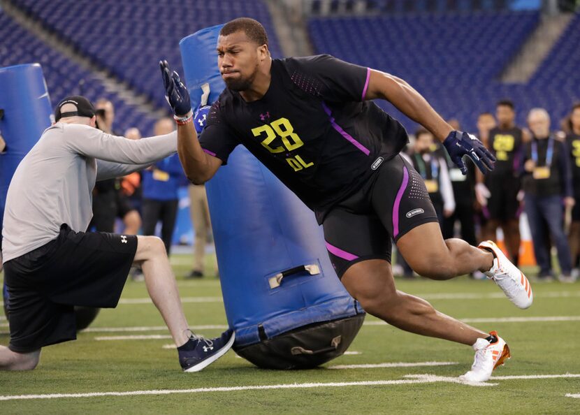 North Carolina State defensive lineman Bradley Chubb runs a drill at the NFL football...