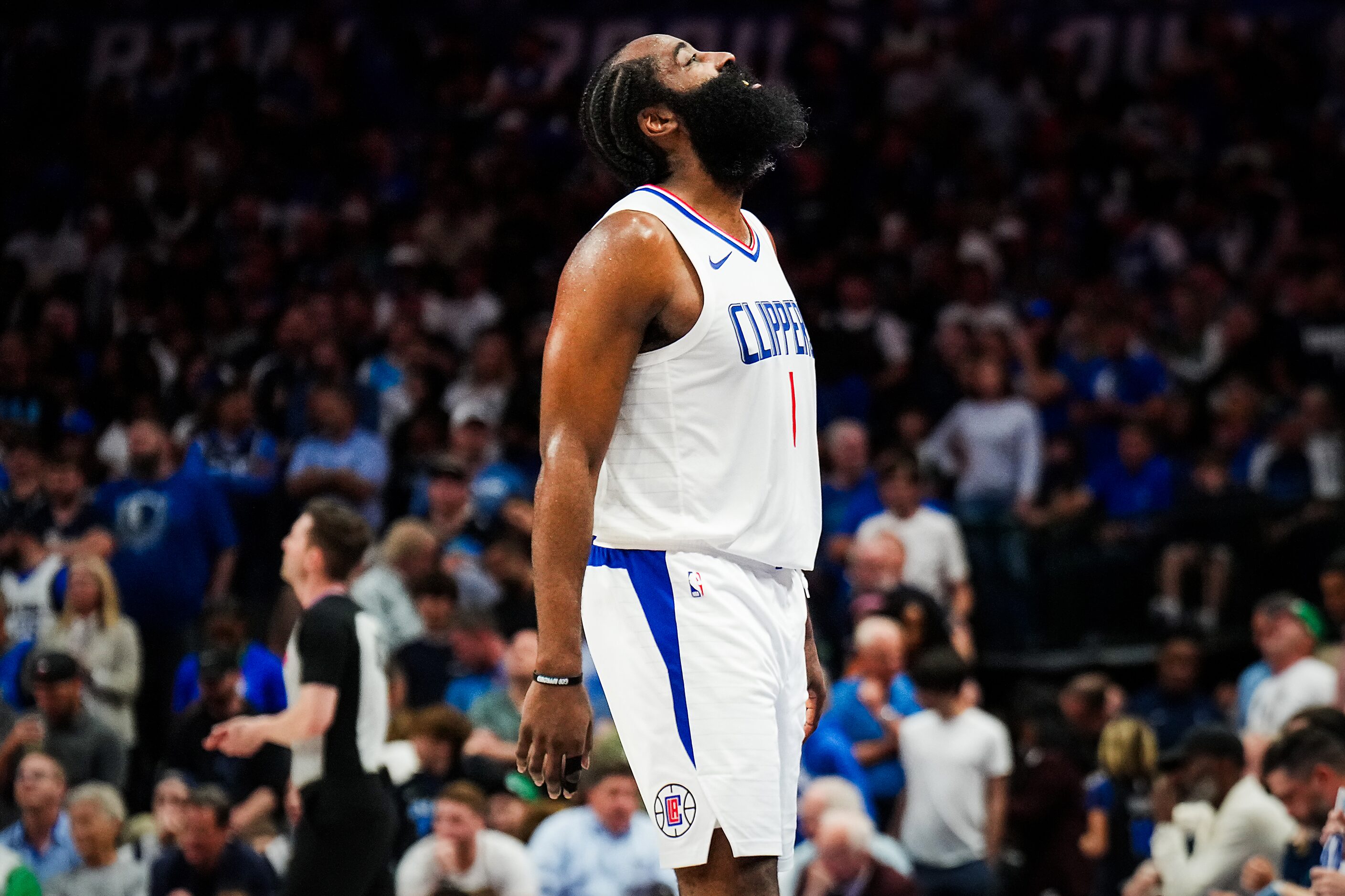 LA Clippers guard James Harden celebrates after scoring during the second half of Game 4 of...