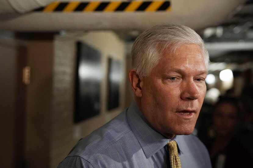 U.S. Rep. Pete Sessions, R-Dallas, speaks to members of the media as he arrives for a...