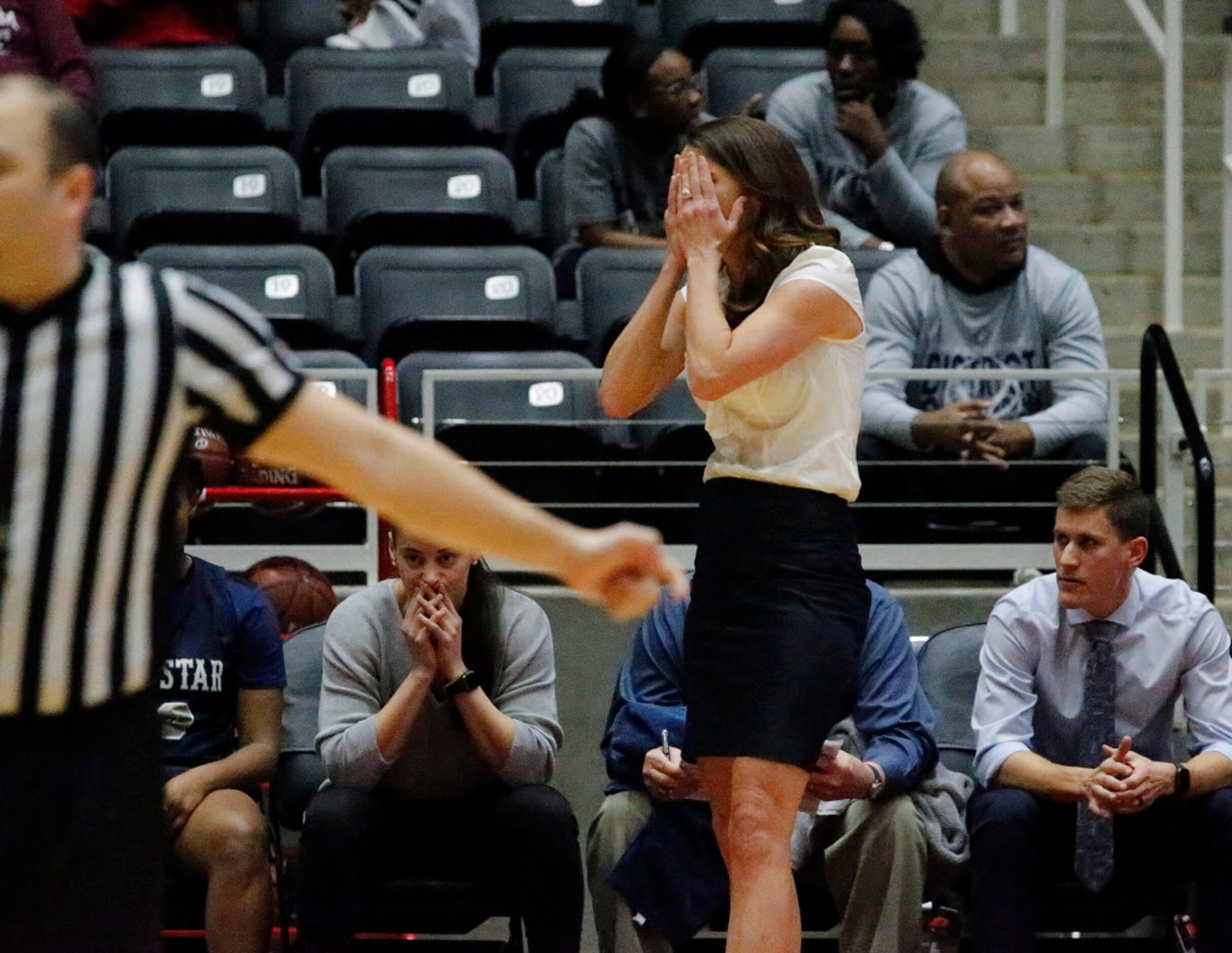 Lone Star head coach Katie Stinton was given a technical foul in overtime for calling a time...