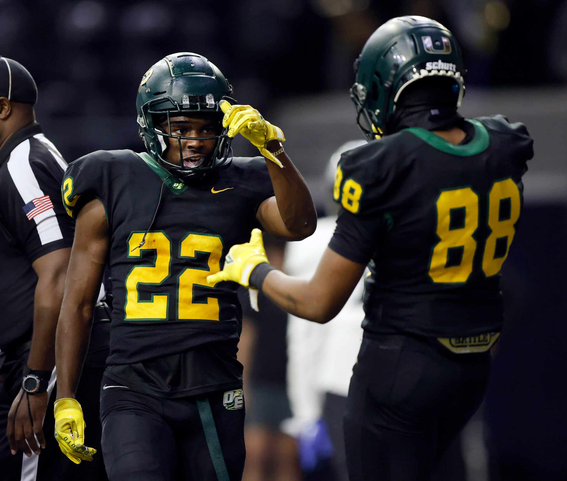 DeSoto running back Deondrae Riden Jr (22) celebrates his second quarter touchdown with...
