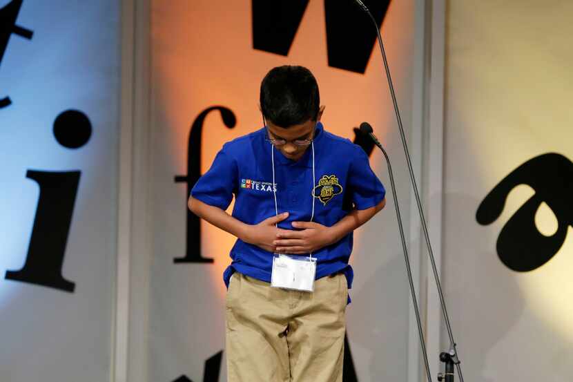 Sohum Sukhatankar, 10, of Allen takes a bow after correctly spelling decamerous to win the...