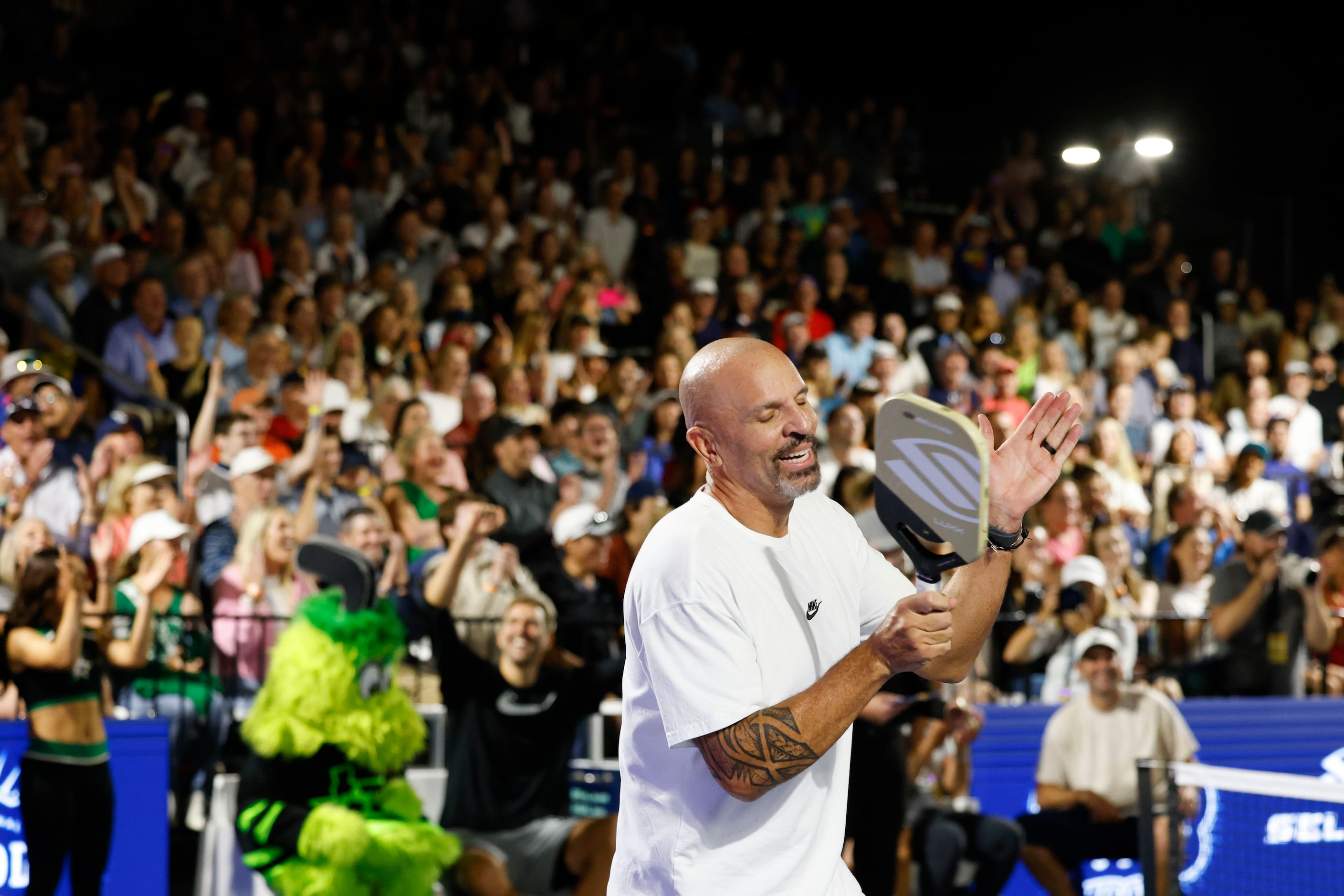 Dallas Mavericks head coach Jason Kidd races after a point during Celebrity Pickleball...