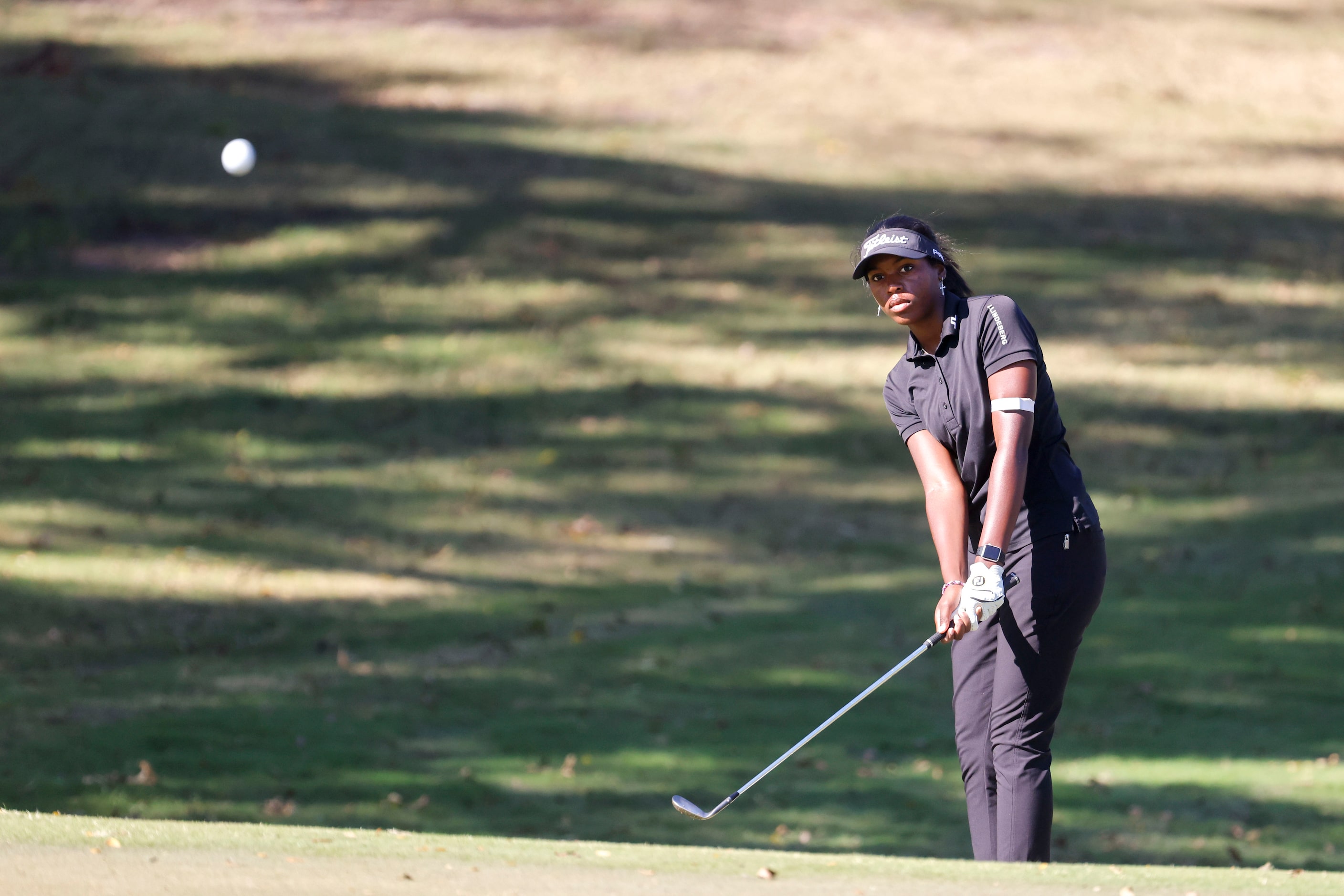 Shyla Brown of McKinney, hits on the first fairway during the Southwest Airlines Showcase...