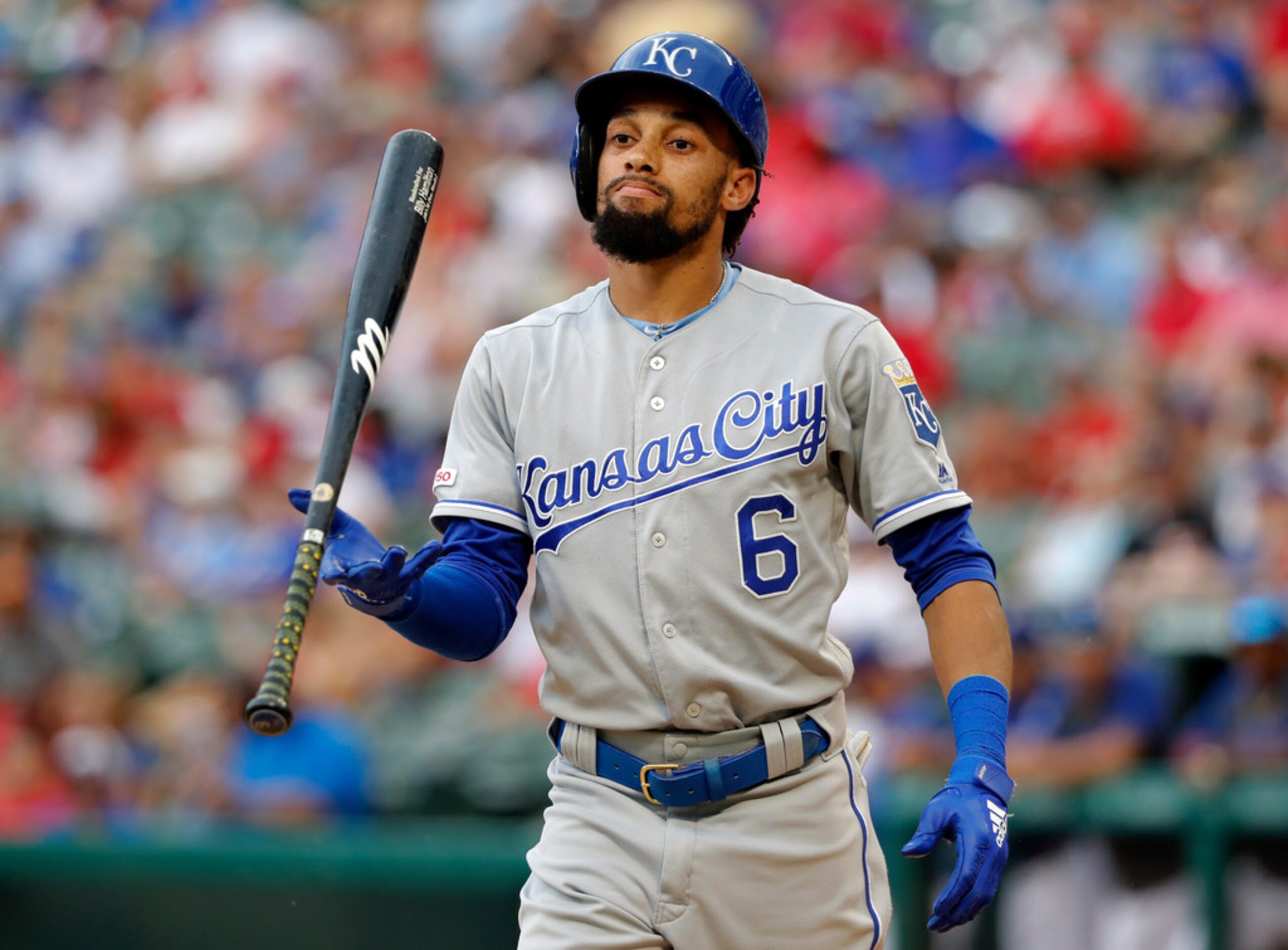 Kansas City Royals' Billy Hamilton flips his bat after striking out in the seventh inning of...