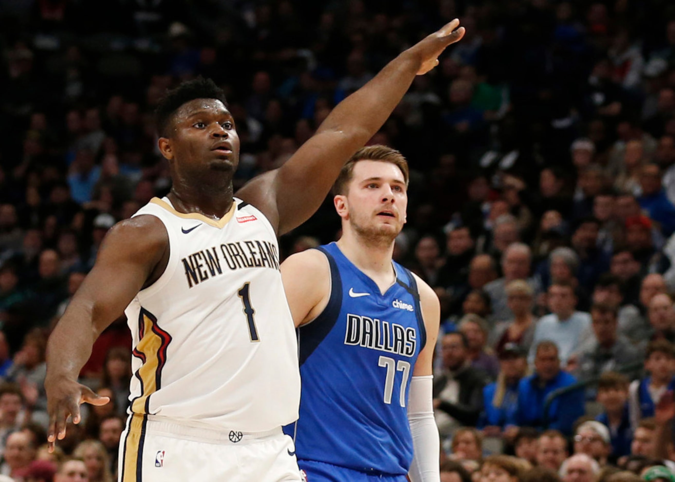 Dallas Mavericks guard Luka Doncic (77) watches his made shot after shooting over New...