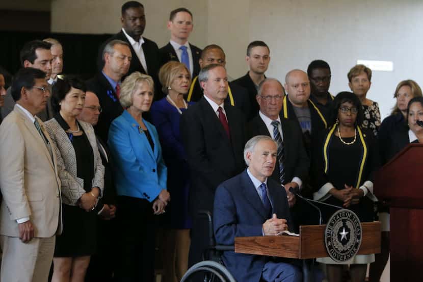 At a news conference in Dallas on July 8, Gov. Greg Abbott responded to questions about the...