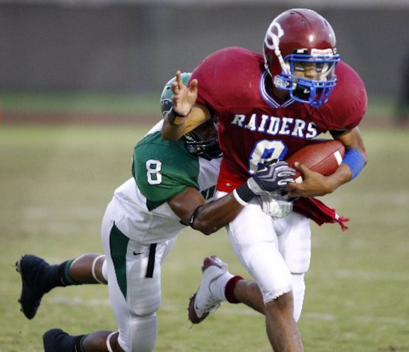 Second-team linebackers: Quentin Coryatt (pictured, 13% of the vote); Jack Pardee (12% of...