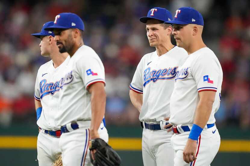 Texas Rangers third baseman Josh Jung,  second baseman Marcus Semien, shortstop Corey Seager...