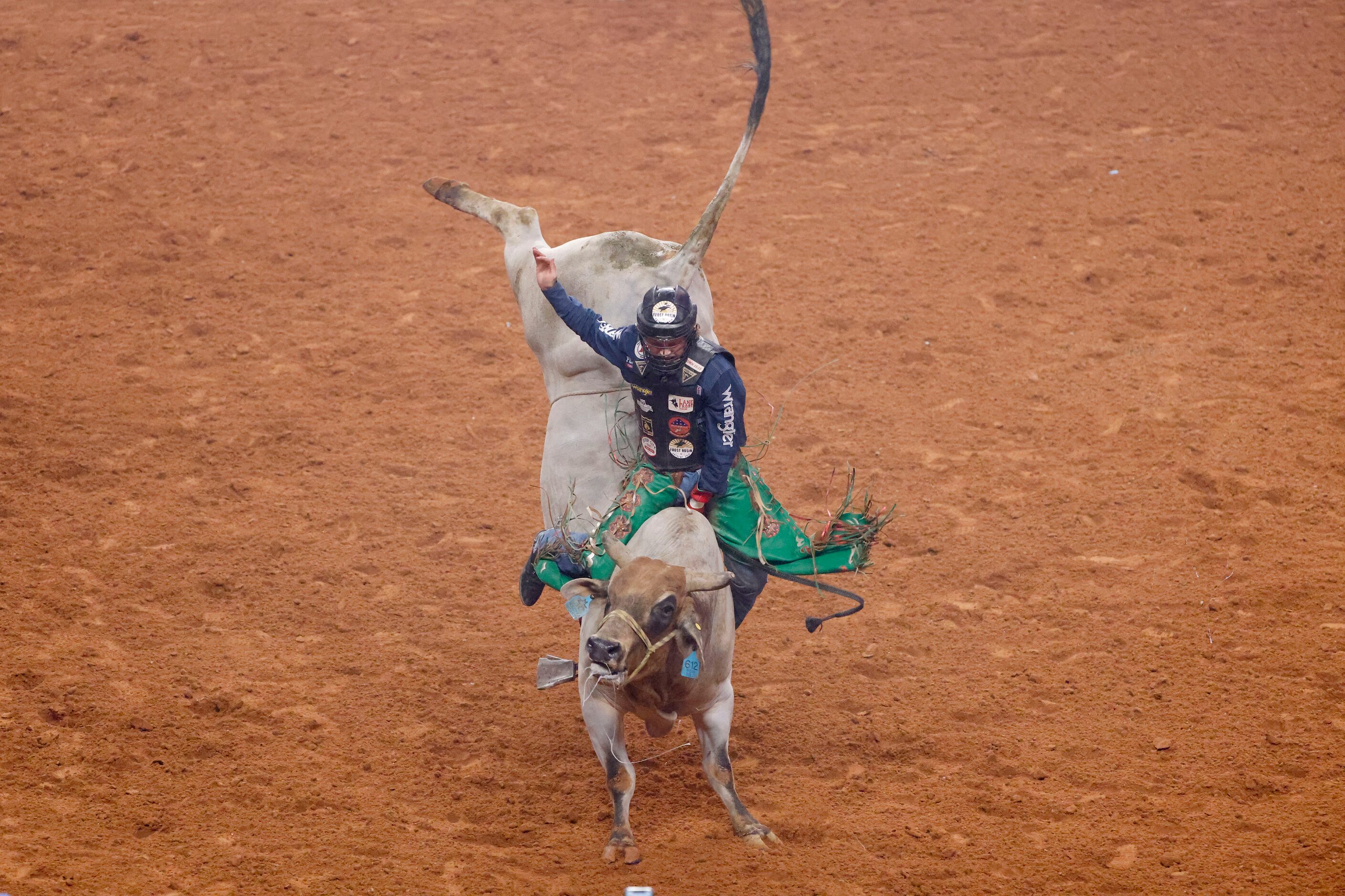 Josh Frost scores a 92.75 on board “Riding Solo” during the PBR World Finals in Fort Worth,...