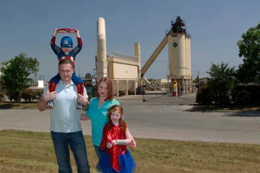 
Robin Harper — with husband John and children Hayden, 4, and Hadley, 6, who wear superhero...