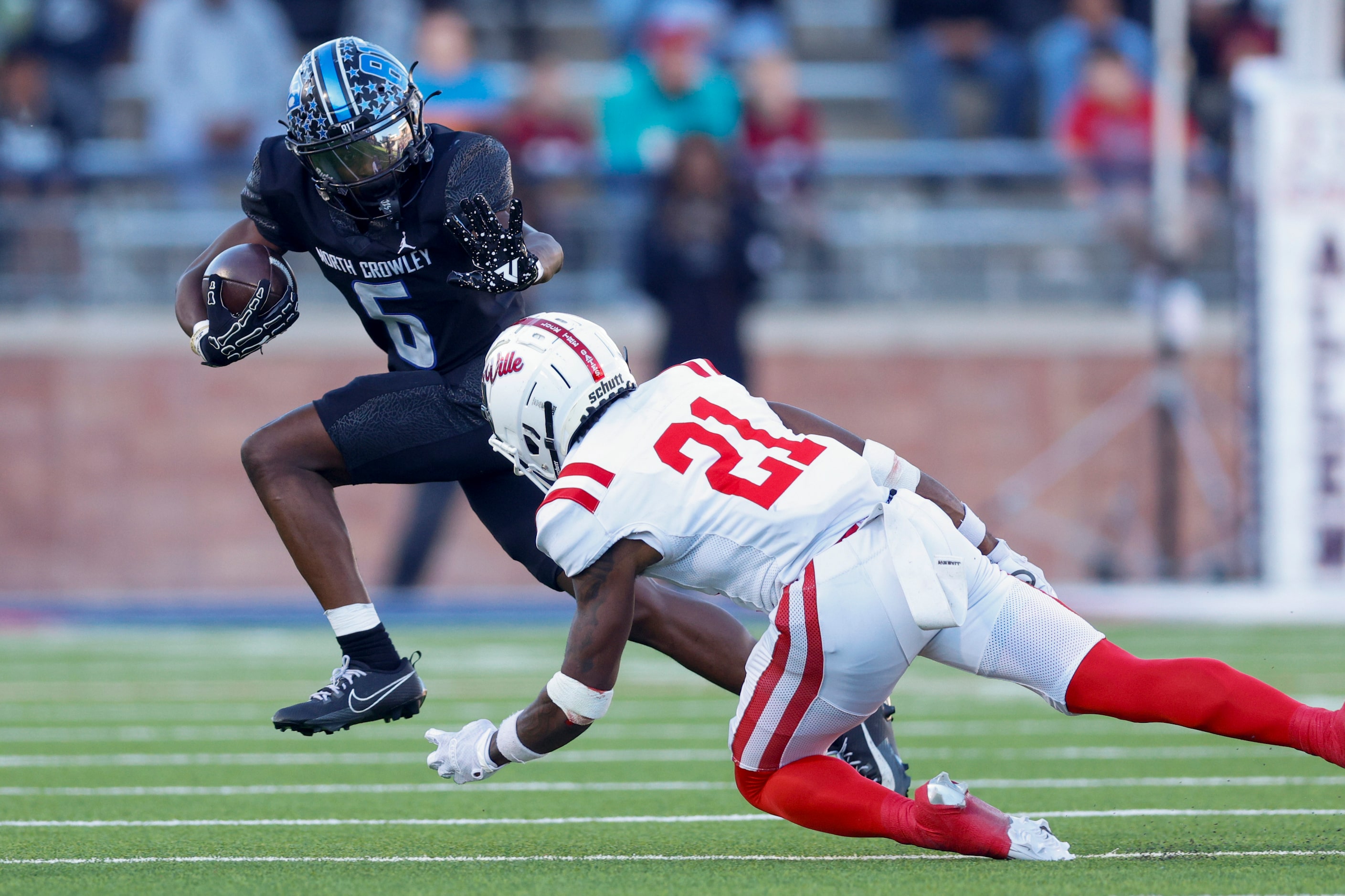 during the first half of a Class 6A Division I state semifinal game, Saturday, Dec. 14,...