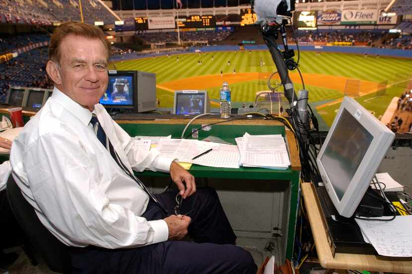 FILE - Baseball announcer Tim McCarver poses in the press box before the start of Game 2 of...