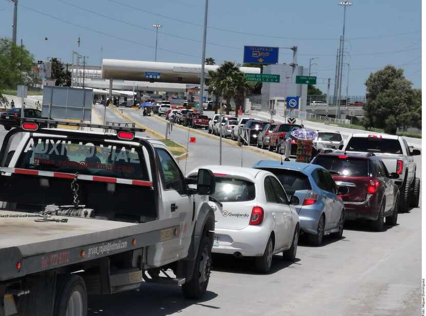 Thousands of vehicles cross the international bridge into Matamoros. 