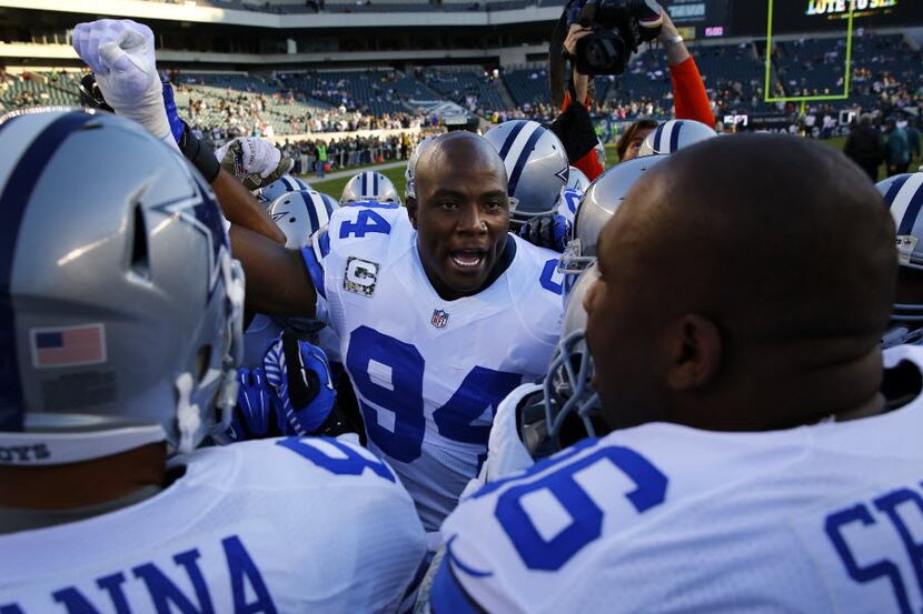 Dallas Cowboys outside linebacker DeMarcus Ware (94) huddles up the team before facing the...