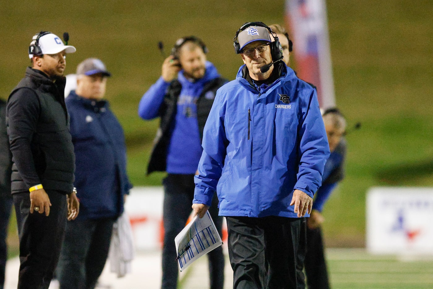 Dallas Christian head coach Mike Wheeler walks the sideline during a timeout during the...