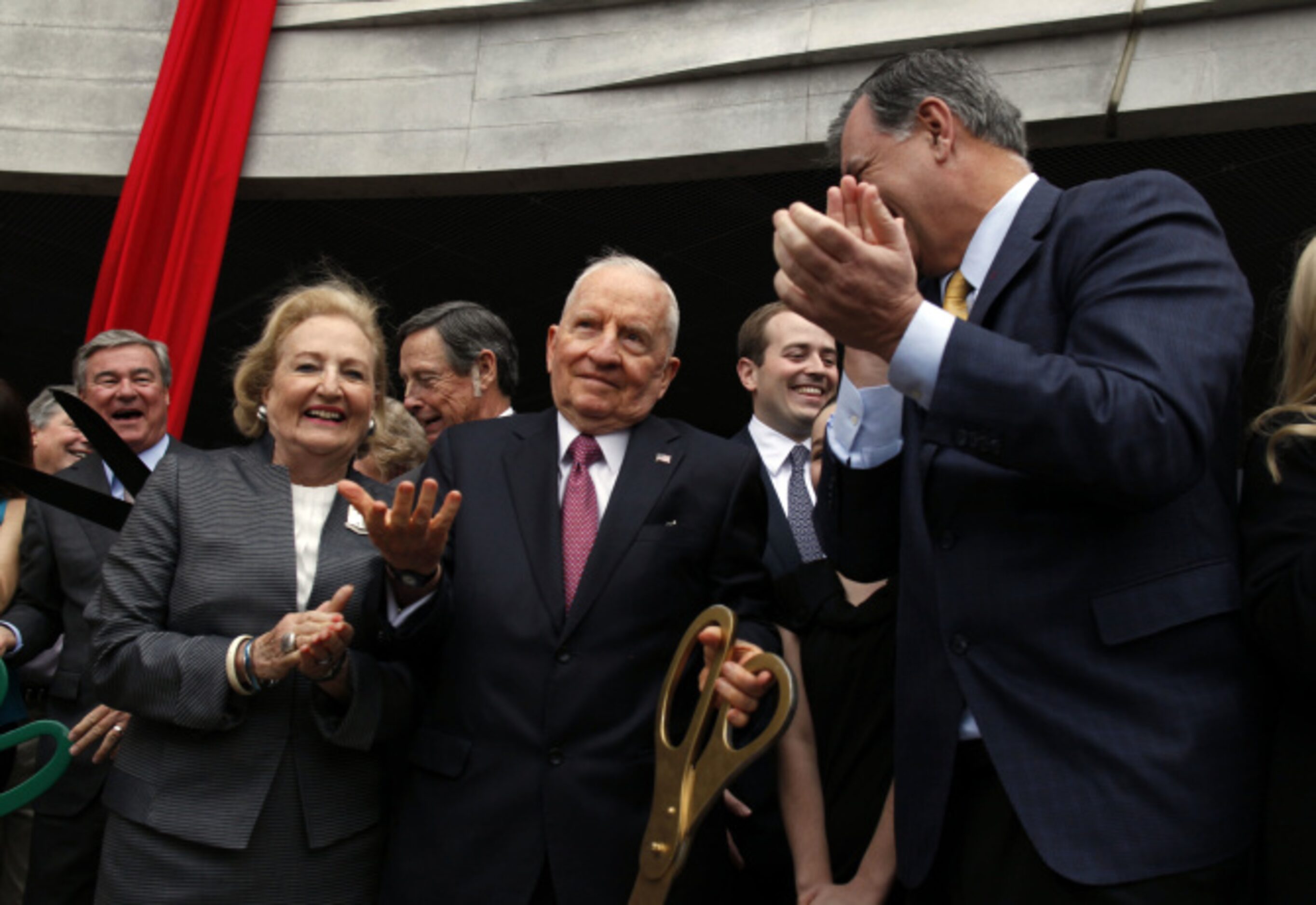 Margot Perot, Ross Perot and Dallas Mayor Mike Rawlings share a laugh after struggling to...