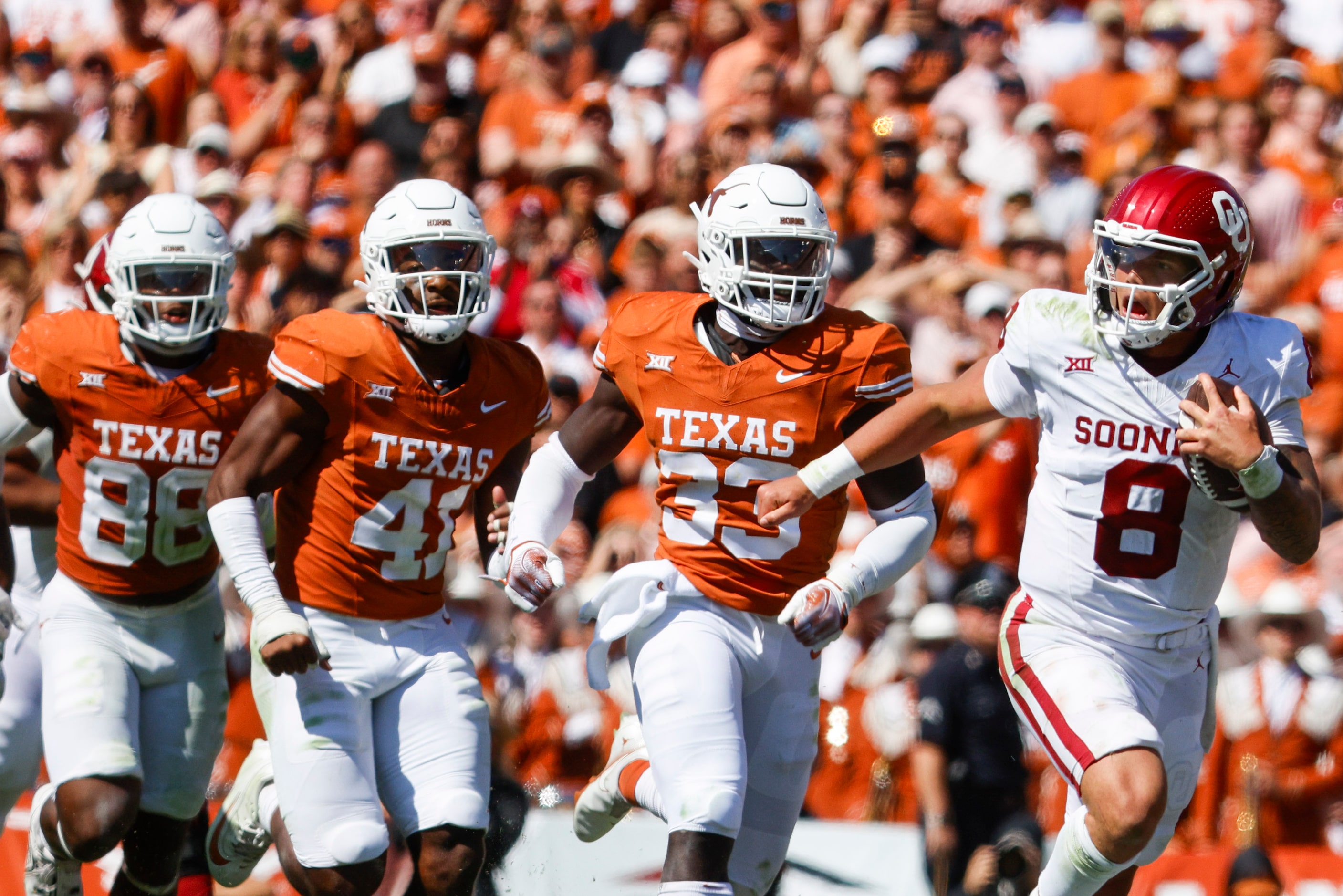 Texas defensive end Barryn Sorrell (88), linebacker Jaylan Ford (41), linebacker David...