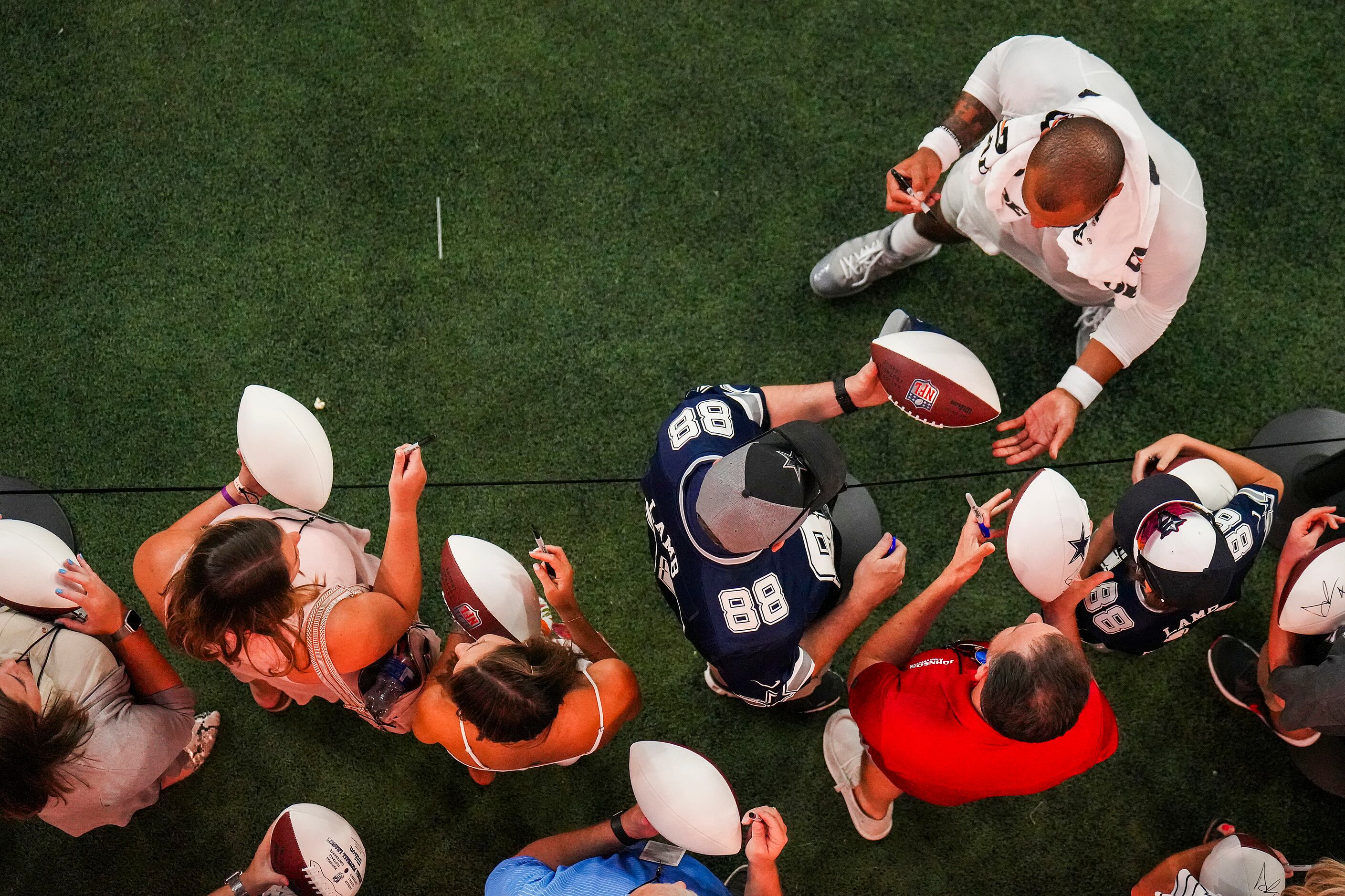 Dak Prescott Holds Baby & Signs Autographs for Dallas Cowboys Fans at  Cowboys Open Practice 