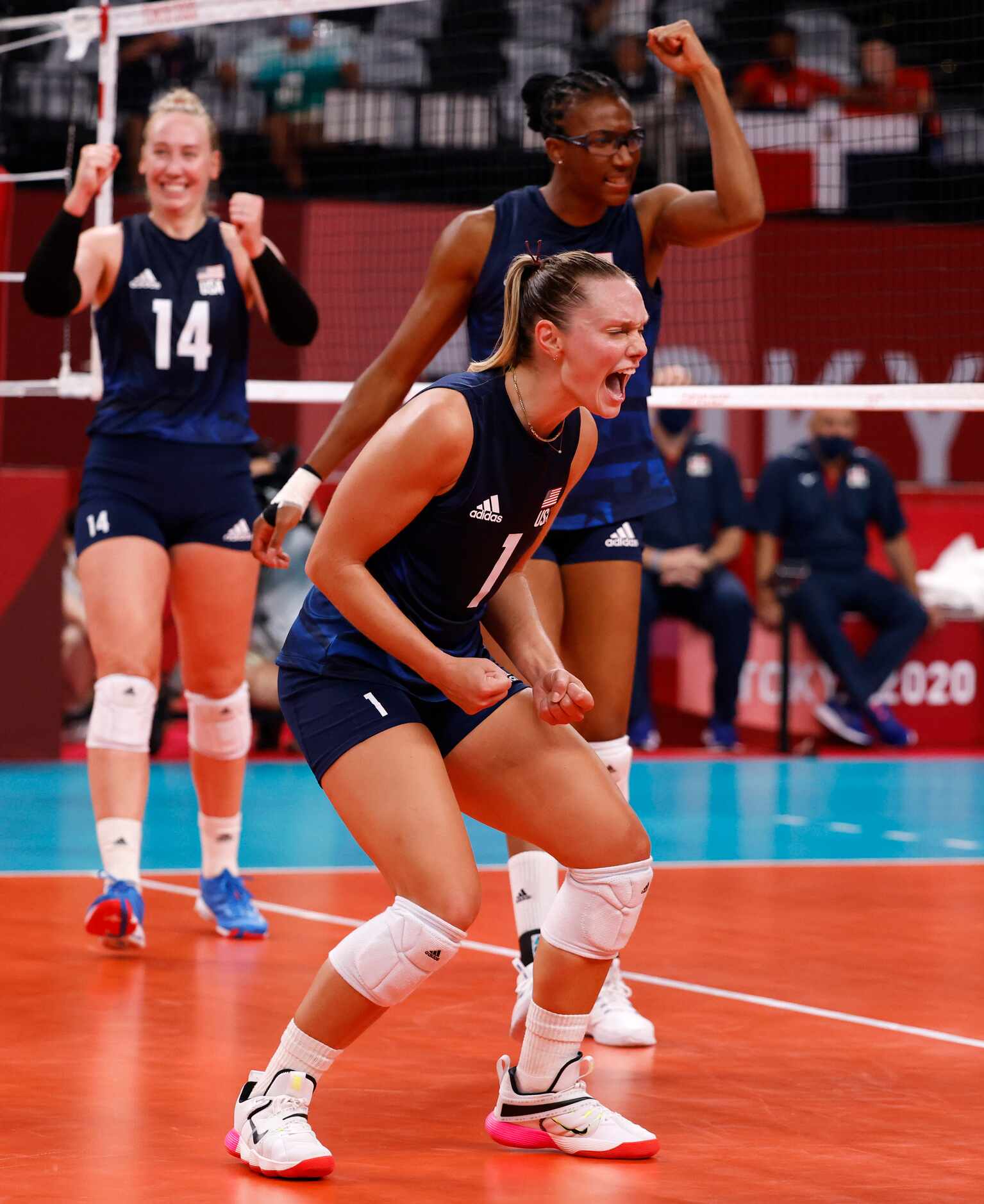 USA’s Micha Hancock (1) and teammates celebrate after scoring a point against the Dominican...