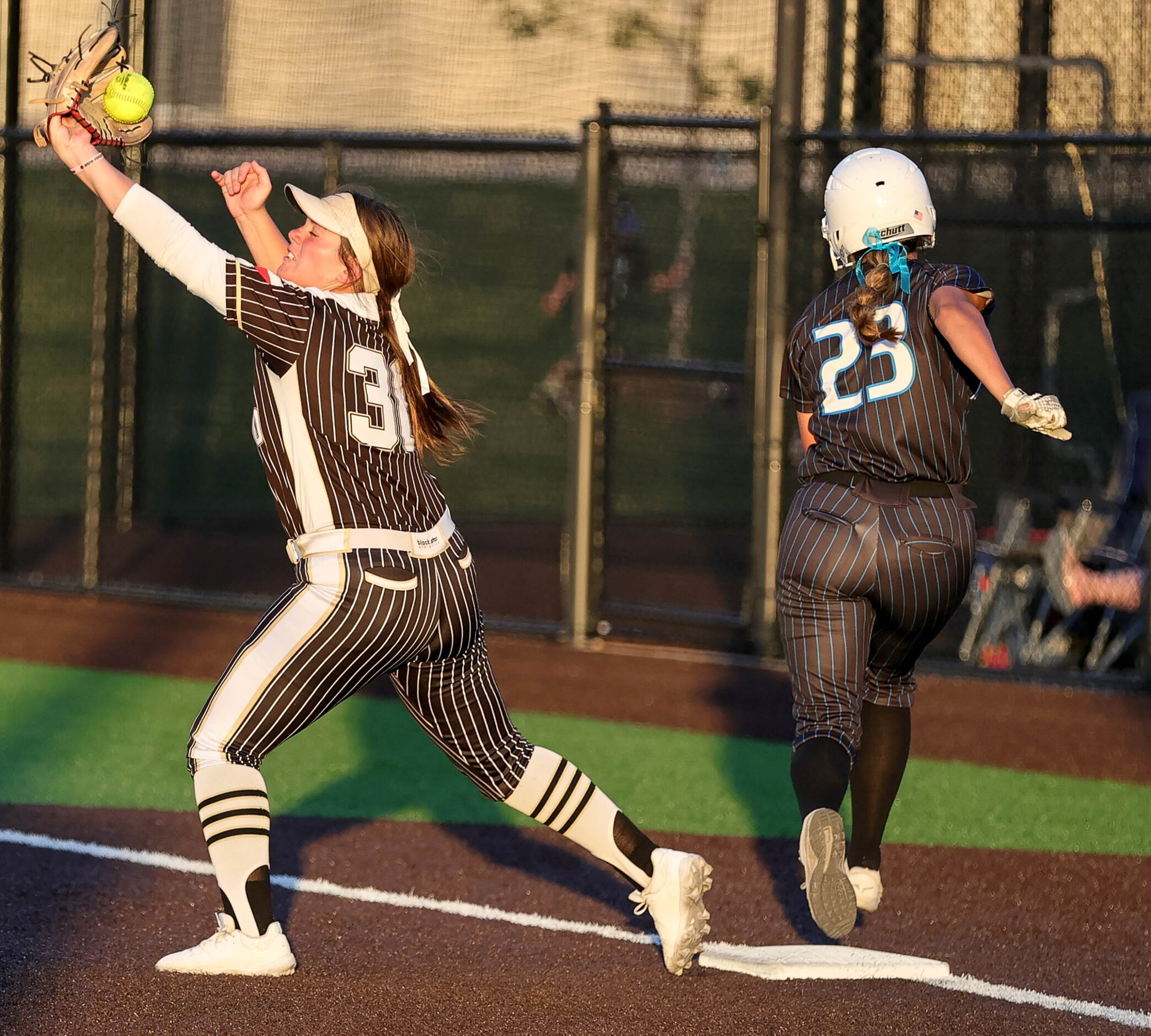Royce City first baseman Emma Moore (30) can't handle a throw at first base against Prosper...