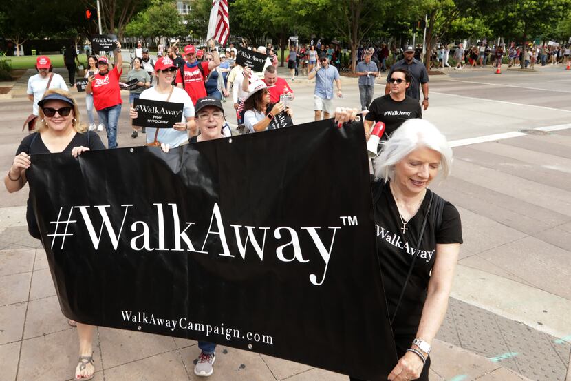 Several hundred people took part in Saturday's WalkAway Rescue America Rally in downtown...