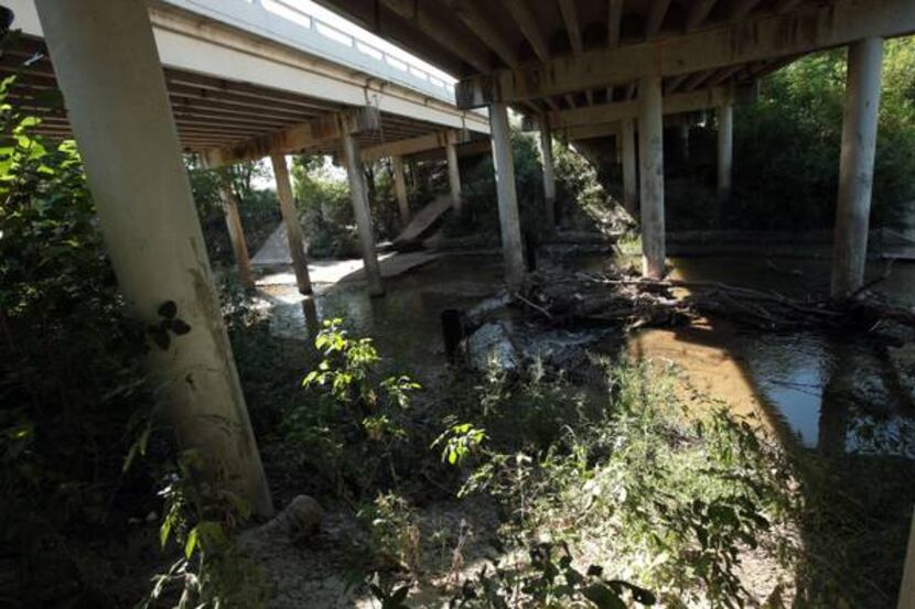 The creek is a complicated issue for cleanup because it is on mostly private land held in an...