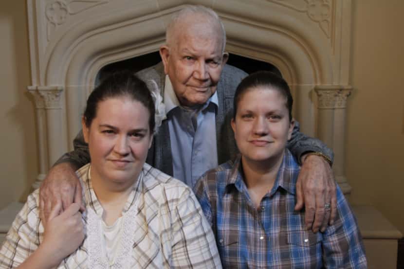 Sandy Dial’s daughters, Miranda Wimberley (left) and Breana Burkhead, and their paternal...