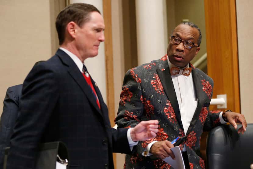 County Judge Clay Jenkins with County Commissioner John Wiley Price after a commissioners...