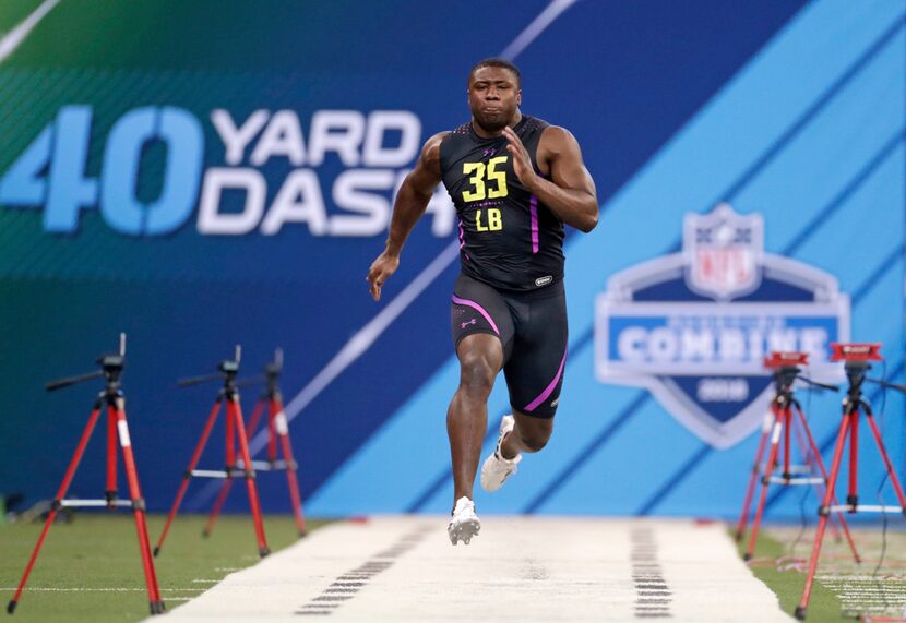 Georgia linebacker Roquan Smith runs the 40-yard dash at the NFL football scouting combine...