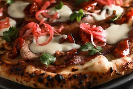 A Texas-only pizza from Pizzana is the Affumicata: Pecan Lodge brisket, smoked fior di...