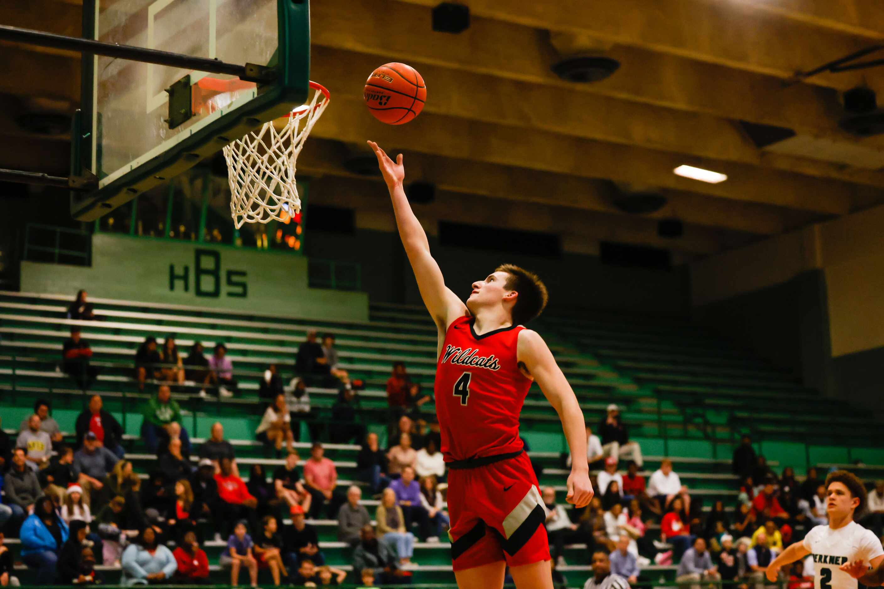 Lake Highlands High School' Warren Hamilton #4, goes for a shot during the second half...