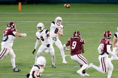 Aledo quarterback Hauss Hejny (8) throws a first quarter pass against Red Oak in their Class...