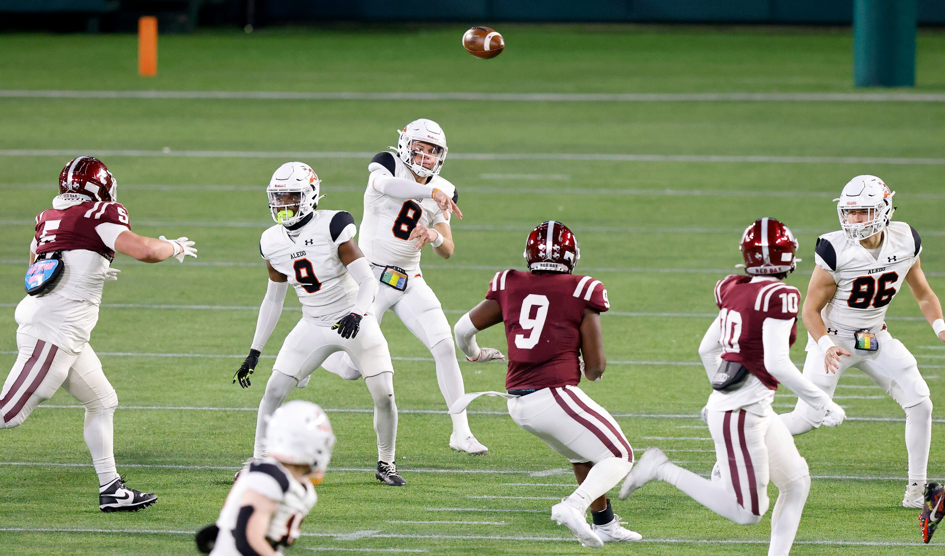 Aledo quarterback Hauss Hejny (8) throws a first quarter pass against Red Oak in their Class...