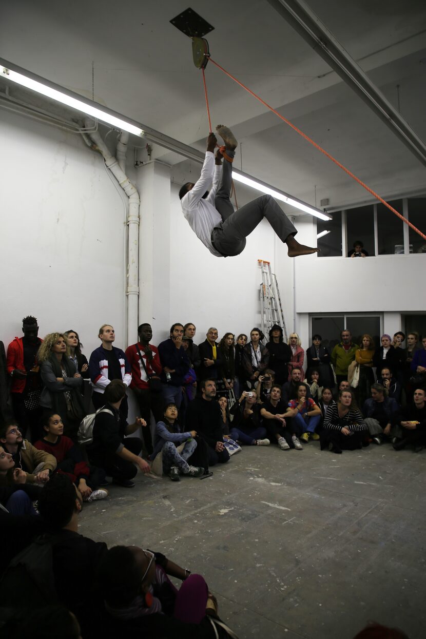 XXavier Carter doing a performance art piece, 'Tuez-Les Tous Performance,' during a show in...