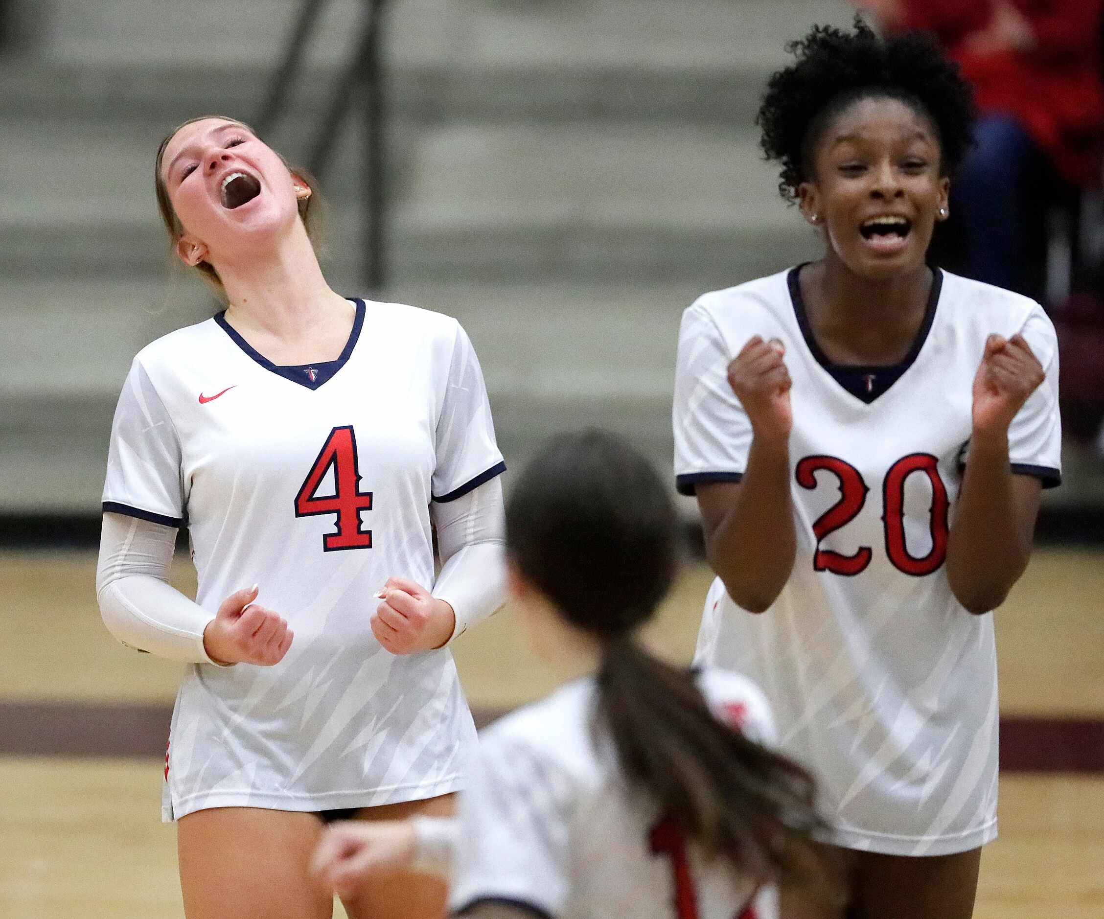 Centennial High School defensive specialist Carsyn Martin (4) and Centennial High School...