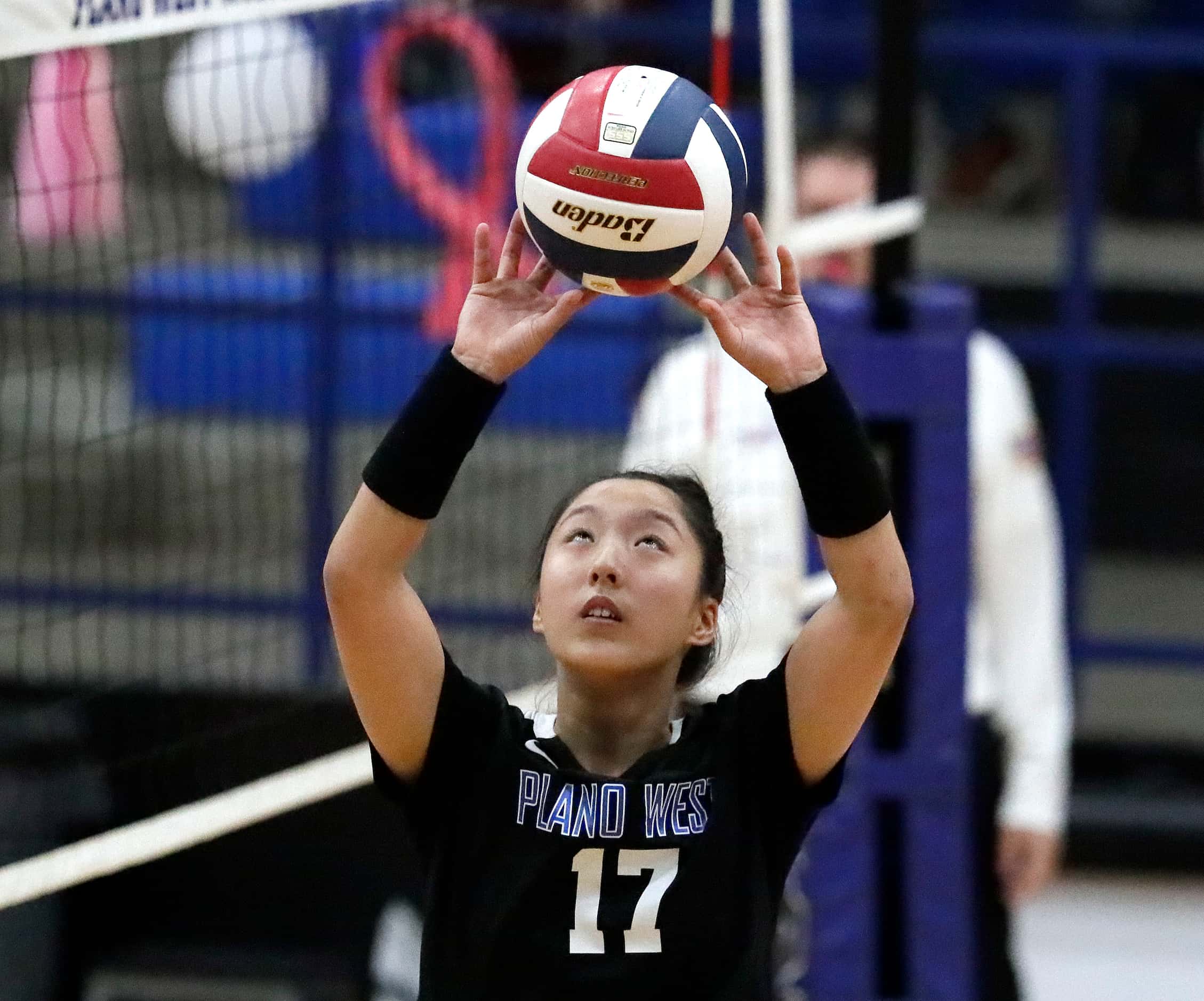 Plano West High School setter Sophia Wei (17) makes a set during game one as Plano West High...